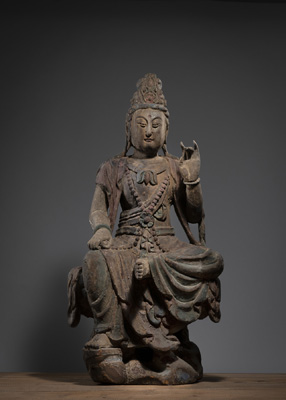 <b>A WOOD FIGURE OF SEATED GUANYIN WITH RESIDUE OF POLYCHROME PAINTING</b>