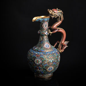 <b>A GILT-BRONZE EWER WITH DRAGON HANDLE AND CHAMPLEVÉ AND CLOISONNÉ DECORATION</b>