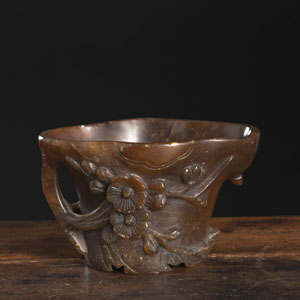 <b>A LOTUS-SHAPED SOAPSTONE LIBATION CUP</b> <b>A LOTUS-SHAPED SOAPSTONE LIBATION CUP</b>