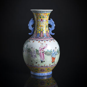 <b>A TWIN-HANDLED 'FAMILLE ROSE' 'PLAYING BOYS' PORCELAIN VASE</b>