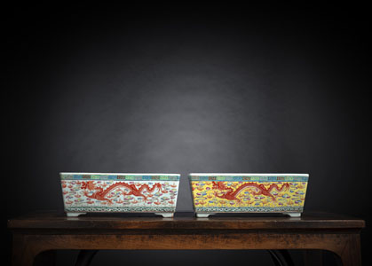 <b>TWO RECTANGULAR YELLOW- AND WHITE-GROUND DRAGON 'FAMILLE ROSE' PORCELAIN JARDINIÈRES</b>