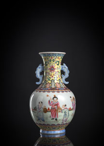 <b>A SMALL 'FAMILLE ROSE' TWIN-HANDLED 'PLAYING BOYS' PORCELAIN VASE</b>