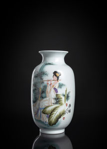 <b>A POLYCHROME 'LADY PLAYING FLUTE' PORCELAIN VASE WITH A INSCRIPTION FROM THE 'ZHU ZI JIA XUN'</b>