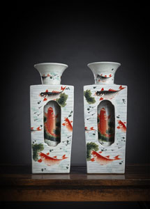 <b>A PAIR OF POLYCHROME CARPS REVOLVING PORCELAIN VASES</b>