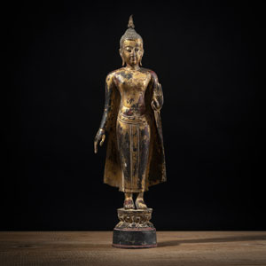 <b>A GILT- LACQUERED WOOD FIGURE OF BUDDHA SHAKYAMUNI</b>