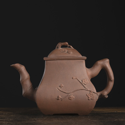 <b>A YIXING 'BAMBOO-PINE-PRUNUS' TEAPOT</b>