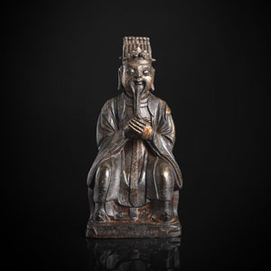 <b>Bronze eines sitzenden Offiziellen, ehemals wohl ein Zepter haltend mit Resten von Vergoldung</b>