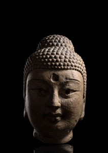 <b>A FINE LARGE AND RARE STONE HEAD OF BUDDHA SHAKYAMUNI</b>