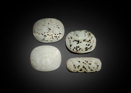 <b>A GROUP OF FOUR FINE CARVED JADE PLACQUES</b>