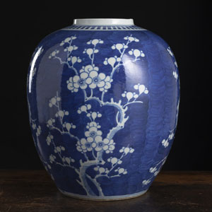 <b>A BLUE AND WHITE PORCELAIN JAR WITH DECORATION OF FLOWERING PRUNUS TREES</b>
