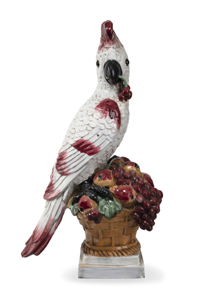 <b>A LARGE NYMPHENBURG MAIOLICA FIGURE OF A COCKATOO WITH FLOWER BASKET</b>