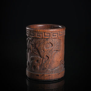 <b>A CARVED WOOD BRUSHPOT WITH FINGER CITRONS AND ROCKS</b>