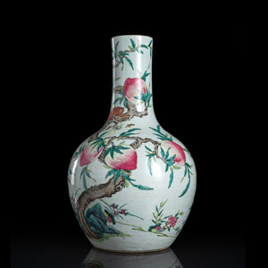 <b>A FAMILLE ROSE 'NINE PEACHES' BOTTLE VASE WITH A MONKEY</b>