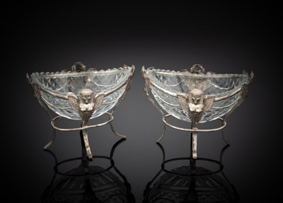 <b>A PAIR OF FILIGREE WORK SIVLER SALT CELLARS WITH SPHINX HEADS AND CUT GLASS LINER</b>