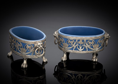<b>A PAIR OF NEOCLASSICAL OPENWORK SILVER SALT CELLARS WITH BLUE GLASS LINERS</b>