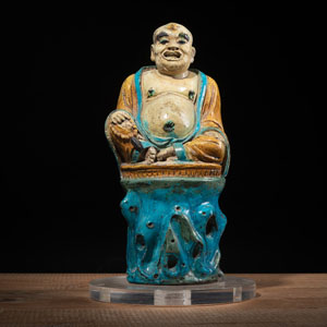 <b>A 'FAHUA' CERAMIC FIGURE OF BUDAI</b> <b>A 'FAHUA' CERAMIC FIGURE OF BUDAI</b>