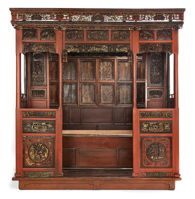 <b>AN ALCOVE BED WITH PARTIALLY GILT OPENWORK RELIEF WOOD PANELS</b>