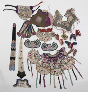 <b>A GROUP OF SILK EMBROIDERIES FOR CHILDREN, A.O. COLLARS, HATS, VESTS, SHOES</b>