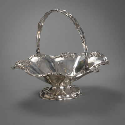 <b>A GERMAN FLORAL PATTERN SILVER FOOTED BOWL WITH HANDLE</b>