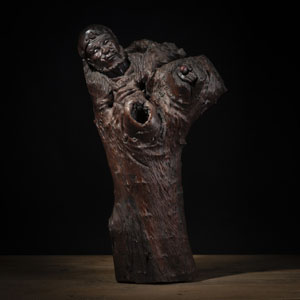 <b>A LARGE ROOTWOOD CARVING OF AN IMMORTAL HOLDING AN ANIMAL</b>