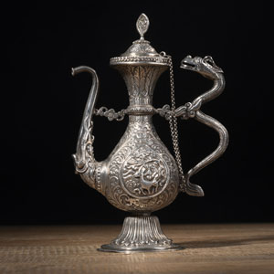 <b>AN ANIMAL RELIEF SILVER EWER WITH DRAGON HANDLE AND ELEPHANT SPOUT</b> <b>AN ANIMAL RELIEF SILVER EWER WITH DRAGON HANDLE AND ELEPHANT SPOUT</b>