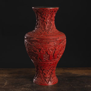 <b>A RED-LACQUER FIGURAL AND LANDSCAPE BALUSTER VASE</b> <b>A RED-LACQUER FIGURAL AND LANDSCAPE BALUSTER VASE</b>