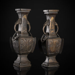 <b>A PAIR OF SQUARE RING-HANDLED BRONZE VASES</b>