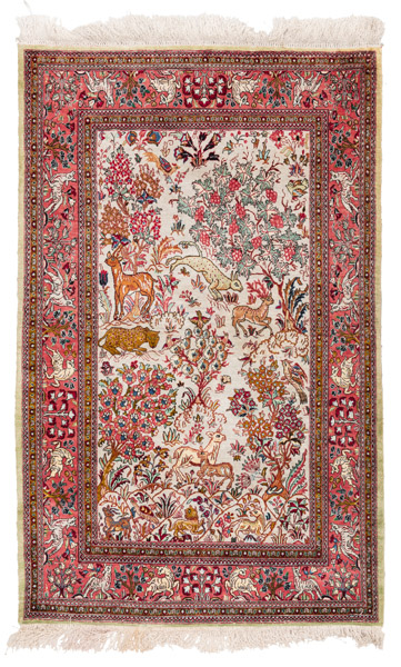 <b>A silk rug with animal and floral motives</b>