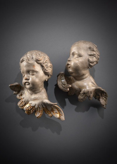 <b>A PAIR OF BAROQUE WINGED PUTTO HEADS</b>