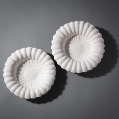 <b>TWO FAIENCE FAN SHAPED ROUND DISHES</b>