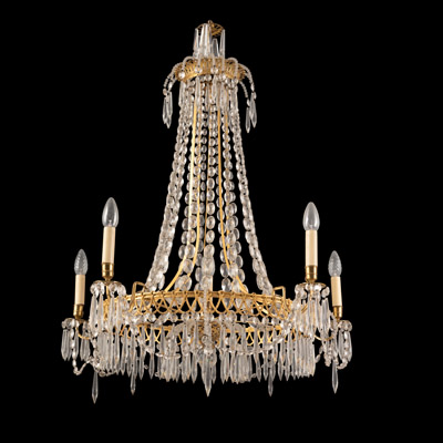 <b>A NEOCLASSICAL BRASS AND CUT GLASS CANDELABRA IN THE MANNER OF SCHINKEL</b>