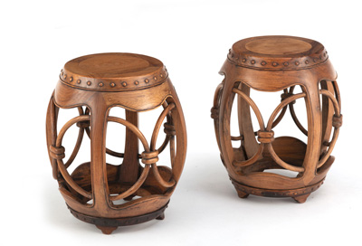 <b>A PAIR OF DRUM-SHAPED HUANGHUALI WOOD STOOLS</b>