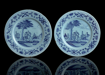 <b>TWO BLUE PAINTED ANSBACH FAIENCE PLATES - SAMSON FIGHTS WITH THE LION</b>