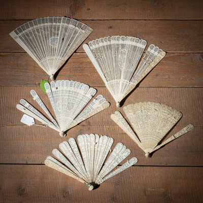 <b>FIVE CARVED AND OPENWORKED IVORY FANS</b>