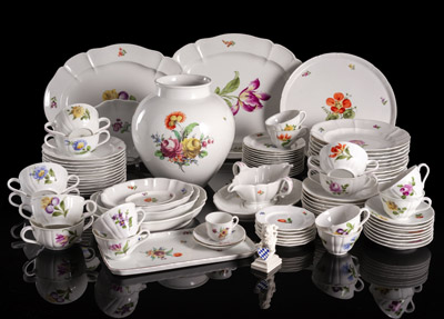 <b>A NYMPHENBURG FLORAL PATTERN DINNER AND COFFEE SERVICE</b>