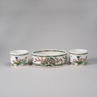 <b>A PAIR OF POLYCHROME PORCELAIN 'BIRDS' CACHEPOTS AND A LARGE BOWL</b>
