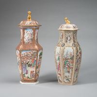 <b>TWO POLYCHROME HEXAGONAL PORCELAIN VASES WITH COVERS</b>