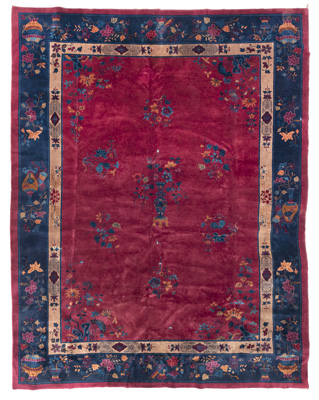 <b>A LARGE PUCE-GROUND FLORAL AND ANTIQUITIES CARPET</b>