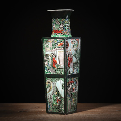 <b>A SQUARE SANCAI GLAZED PORCELAIN VASE DEPICTING NOVEL SCENES IN RELIEF AND PARTLY OPENWORK</b>