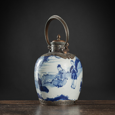 <b>A BLUE AND WHITE FIGURAL PORCELAIN VESSEL WITH COPPER-FITTING</b>