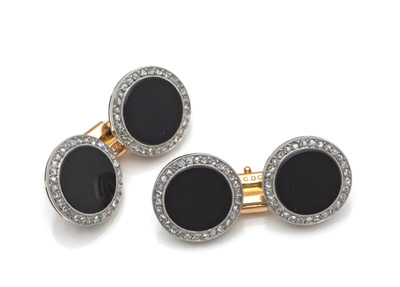 <b>Ein Paar Manschettenknöpfe mit Diamanten und Onyx</b>