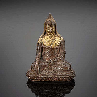 <b>Bronze eines sitzenden Lama mit partieller Vergoldung</b>