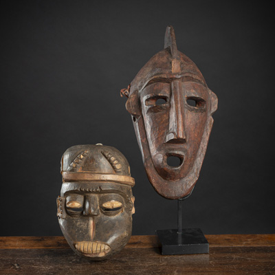 <b>TWO CARVED WOODEN MASKS, ONE WITH STAND</b>