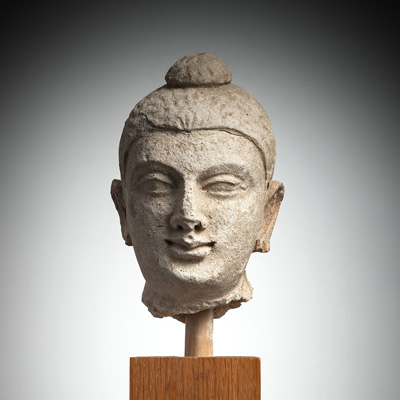 <b>A STUCCO HEAD OF BUDDHA SHAKYAMUNI</b>