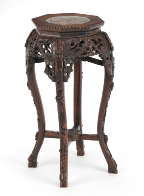 <b>A WOOD OCTAGONAL VASE STAND CARVED WITH PRUNUS AND BUTTERFLY DECORATION AND WITH AN INLAED MARBLE TOP</b>