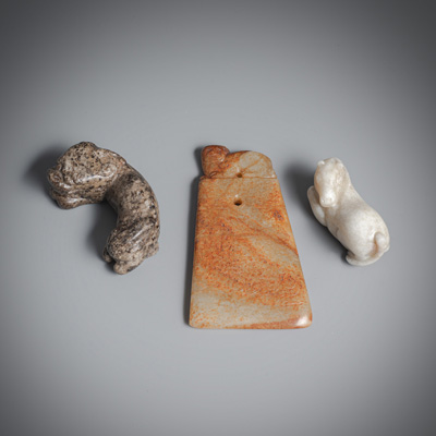 <b>THREE JADE CARVINGS OF A HORSE, A FELINE, AND A HATCHET</b>