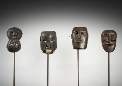 <b>Drei Holzmasken, teils mit Kinnbart, und eine seltene Doppelmaske</b>