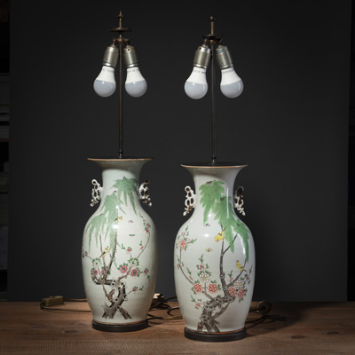 <b>TWO FAMILLE ROSE PORCELAIN VASES DEPICTING A PAIR OF ORIOLES ON FLOWERING PEACH BRANCHES UNDER A WILLOW</b>