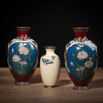 <b>A PAIR OF FLORAL CLOISONNÉ-ENAMEL VASES AND A SMALLER VASE WITH BUTTERFLIES</b>