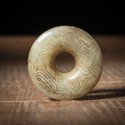 <b>A RELIEF CARVED JADE PENDANT</b>
